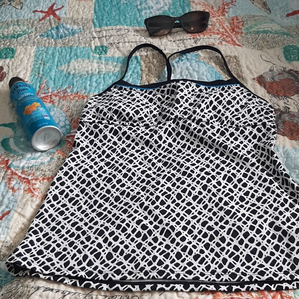 Nike bathing suit top, black and white with aqua trim.